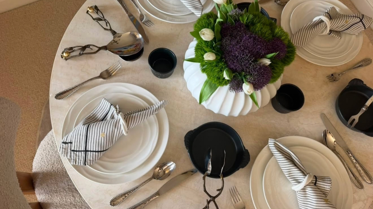 Styled dinner table with Natural Waves dinnerware, set for hosting guests