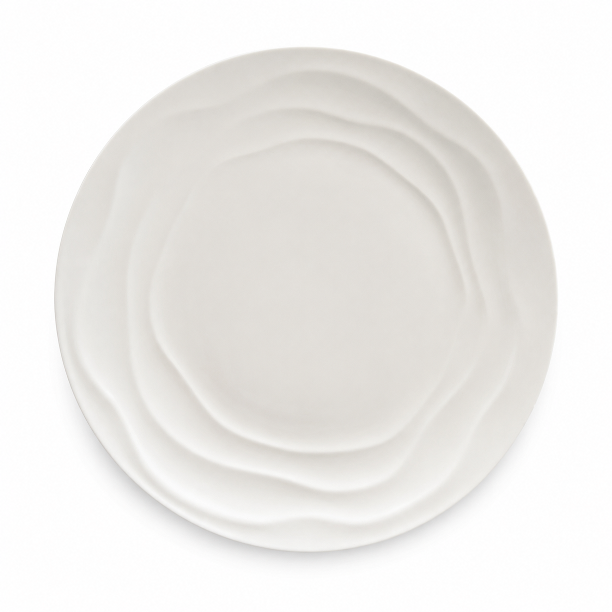 Top-down view of a single Natural Waves bone china plate showing the embossed wave pattern
